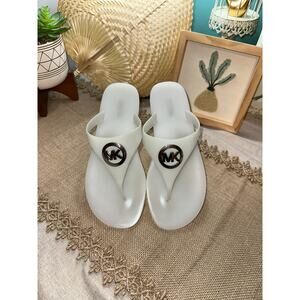 Michael Kors MK round Silver Logo size 8M White Clearish Jelly Thong Sandals GUC